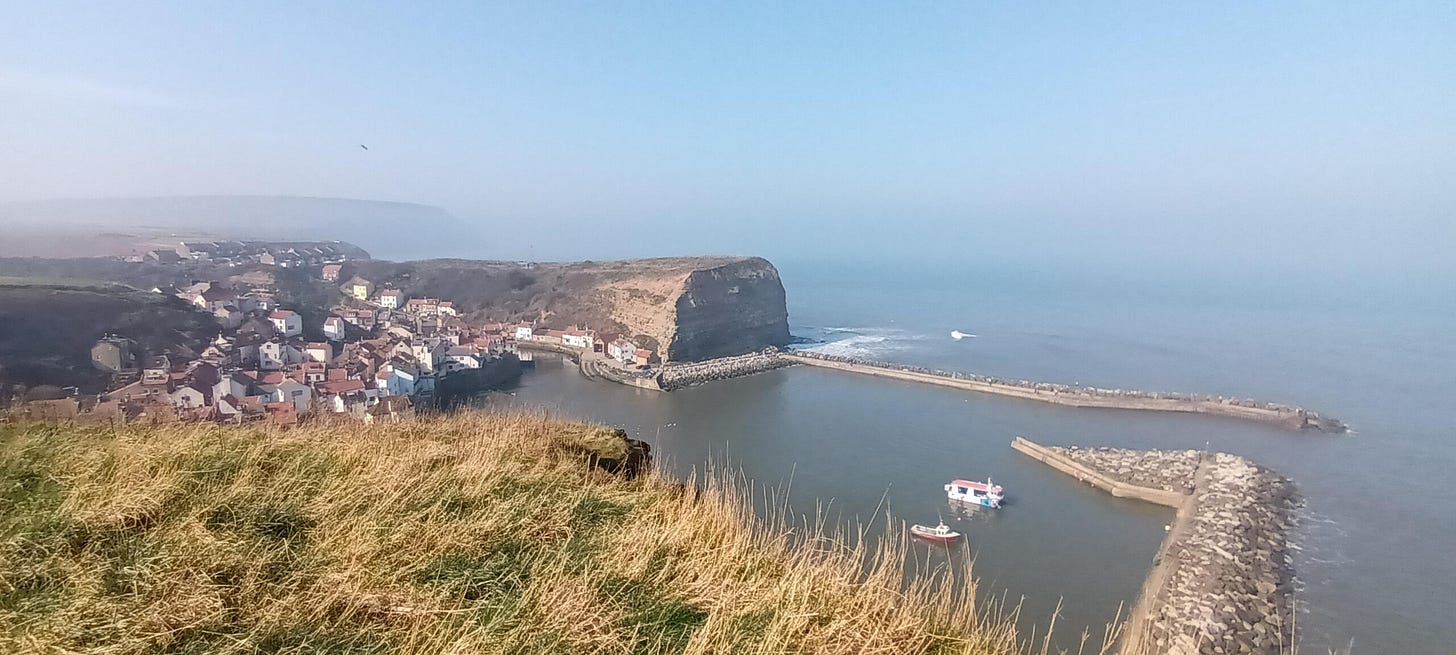 View of the fishing village of Staithes from the cliffs above