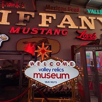 a host of signs from the Valley Relics Museum