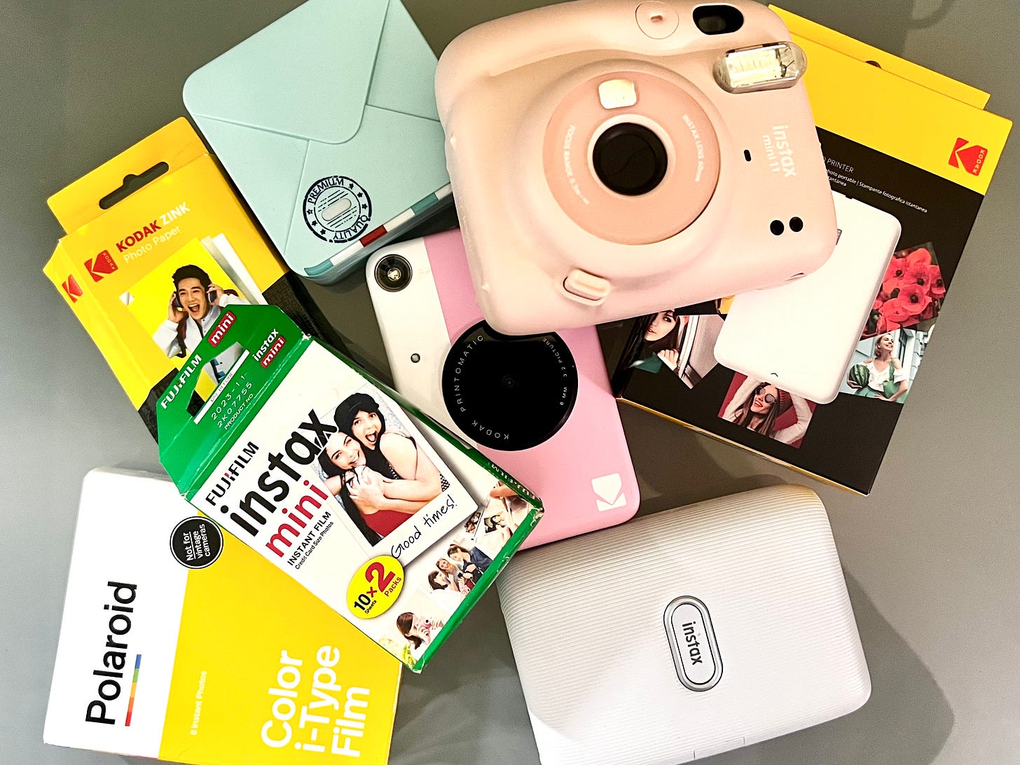 Instant cameras, instant printers, and instant film