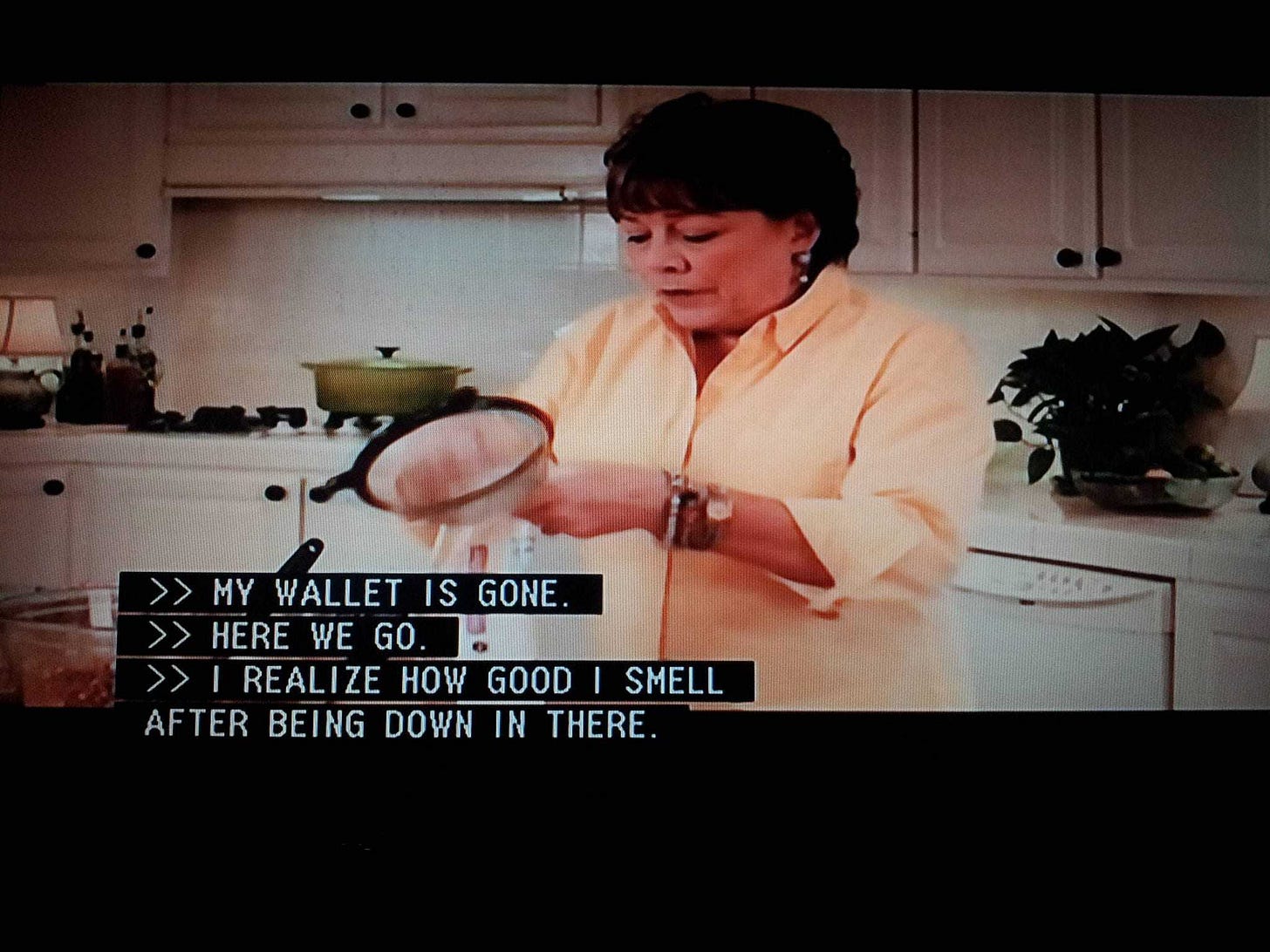 A woman is cooking with a caption that reads "I realize how good I smell after being down in there"