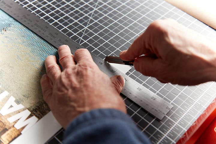 Gluing, triming, and punching a homemade linen hinge
