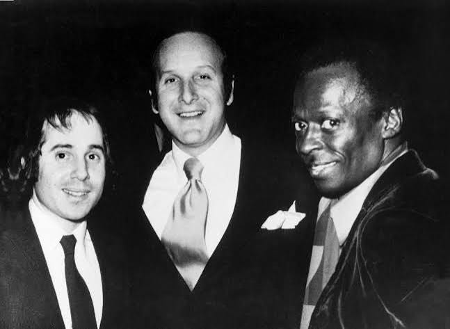 Paul Simon, Clive Davis and Miles Davis at the Anti-Defamation League Luncheon, 1970 - Official_photo - Clive Davis