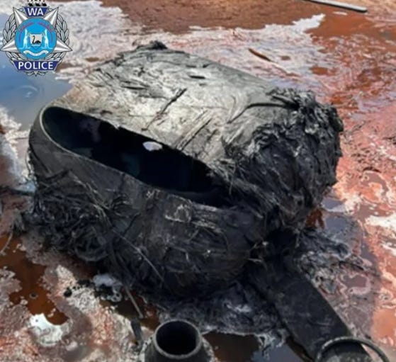 A black bag on a muddy surface

AI-generated content may be incorrect.