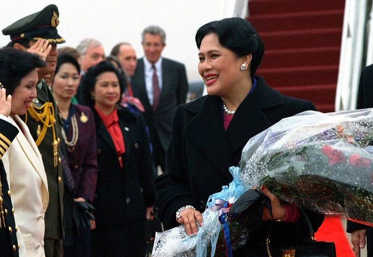 Sirikit Kitiyakara, the queen of Thailand, smiles as she meets officials gathered to greet her upon her arrival on Andrews Air Force Base, Maryland, USA, in 1991. Sirikit Kitiyakara, the queen of Thailand, smiles as she meets officials gathered to greet her upon her arrival on Andrews Air Force Base, Maryland, USA, in 1991.