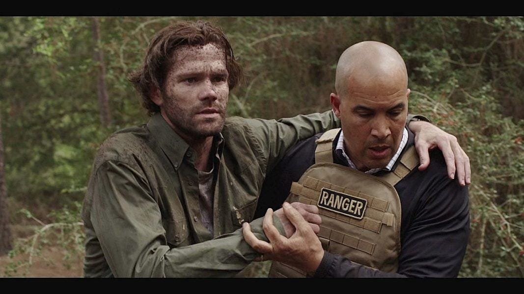 Walker James helping Cordell after being buried alive. Walker James helping Cordell after being buried alive.