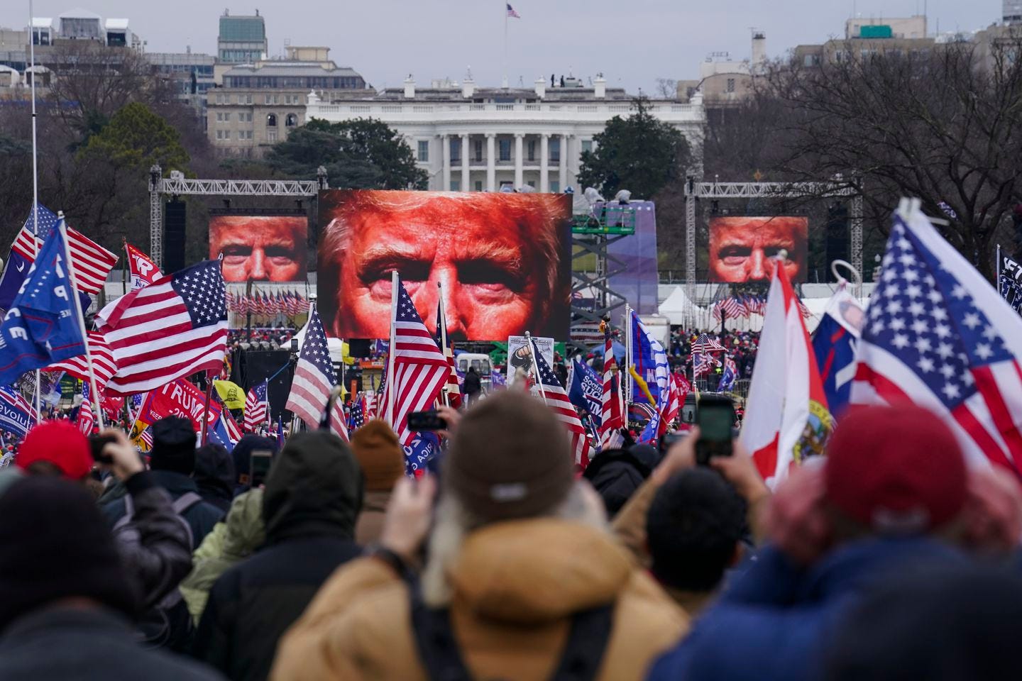 Trump supporters rally in Washington on Jan. 6 before storming the US Capitol. Far-right social media users for weeks openly hinted in widely shared posts that chaos would erupt at the Capitol when Congress convened to certify the election results.