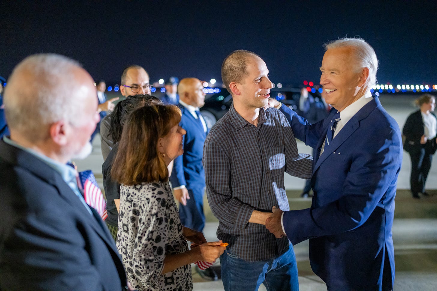President Biden greets Americans previously detained in Russia on the tarmac of Joint Base Andrews.