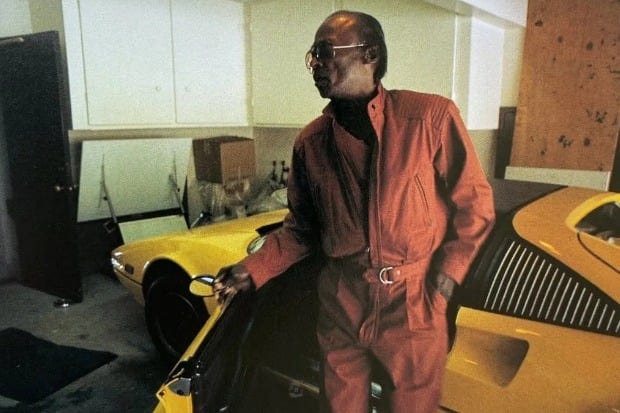 r/Jazz - a person standing next to a yellow car r/Jazz - a person standing next to a yellow car