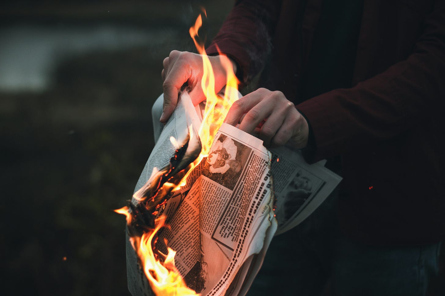An old newspaper is on fire