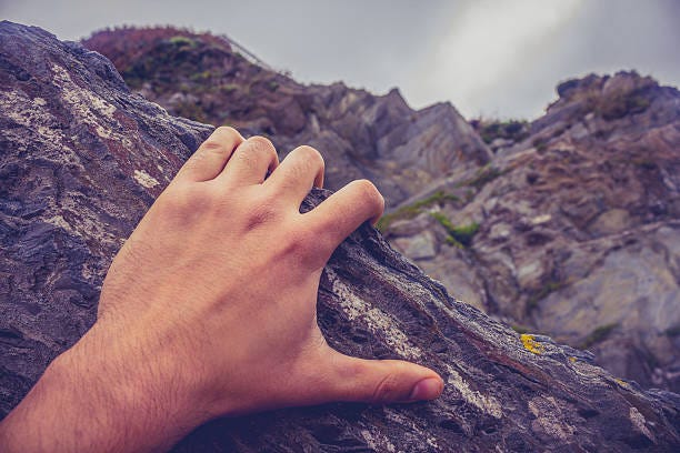 3,000+ Hand Gripping Rock Stock Photos, Pictures & Royalty-Free Images -  iStock