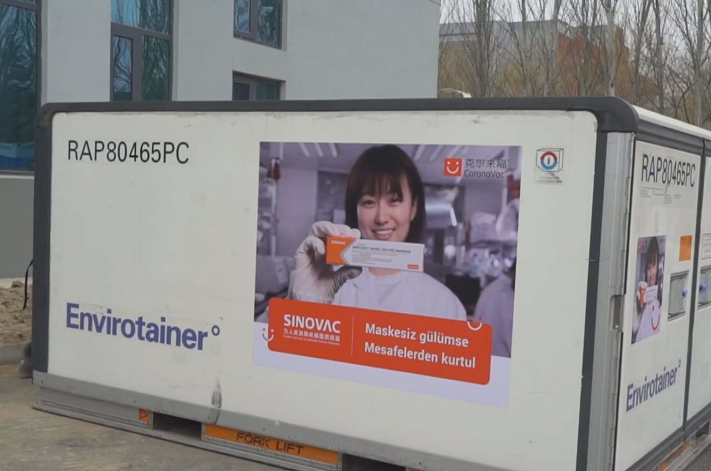 A container filled with vaccines at a Sinovac facility with a message in Turkish reading "Smile without masks, get rid of the distance," in Beijing, China, Dec. 29, 2020. (DHA PHOTO)