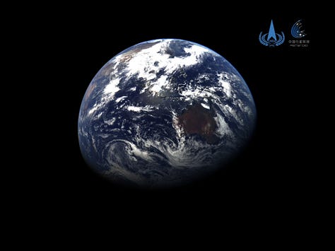 Images taken by Tianwen-2's camera's from earlier in the mission, capturing one of its solar panels, Earth, and the Moon.