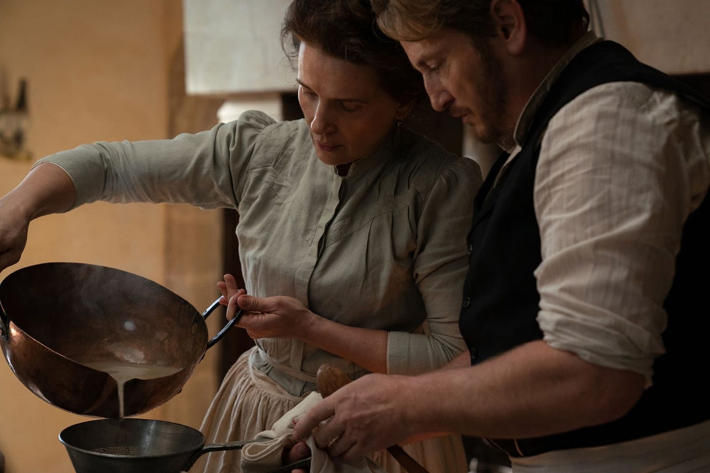 Juliette Binoche as “Eugénie” and Benoît Magimel as “Dodin” in Tran Anh Hung’s THE TASTE OF THINGS. Juliette Binoche as “Eugénie” and Benoît Magimel as “Dodin” in Tran Anh Hung’s THE TASTE OF THINGS.