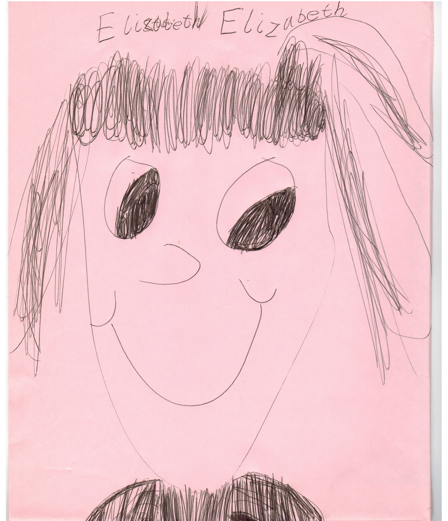 Child's drawing of a face with pen.