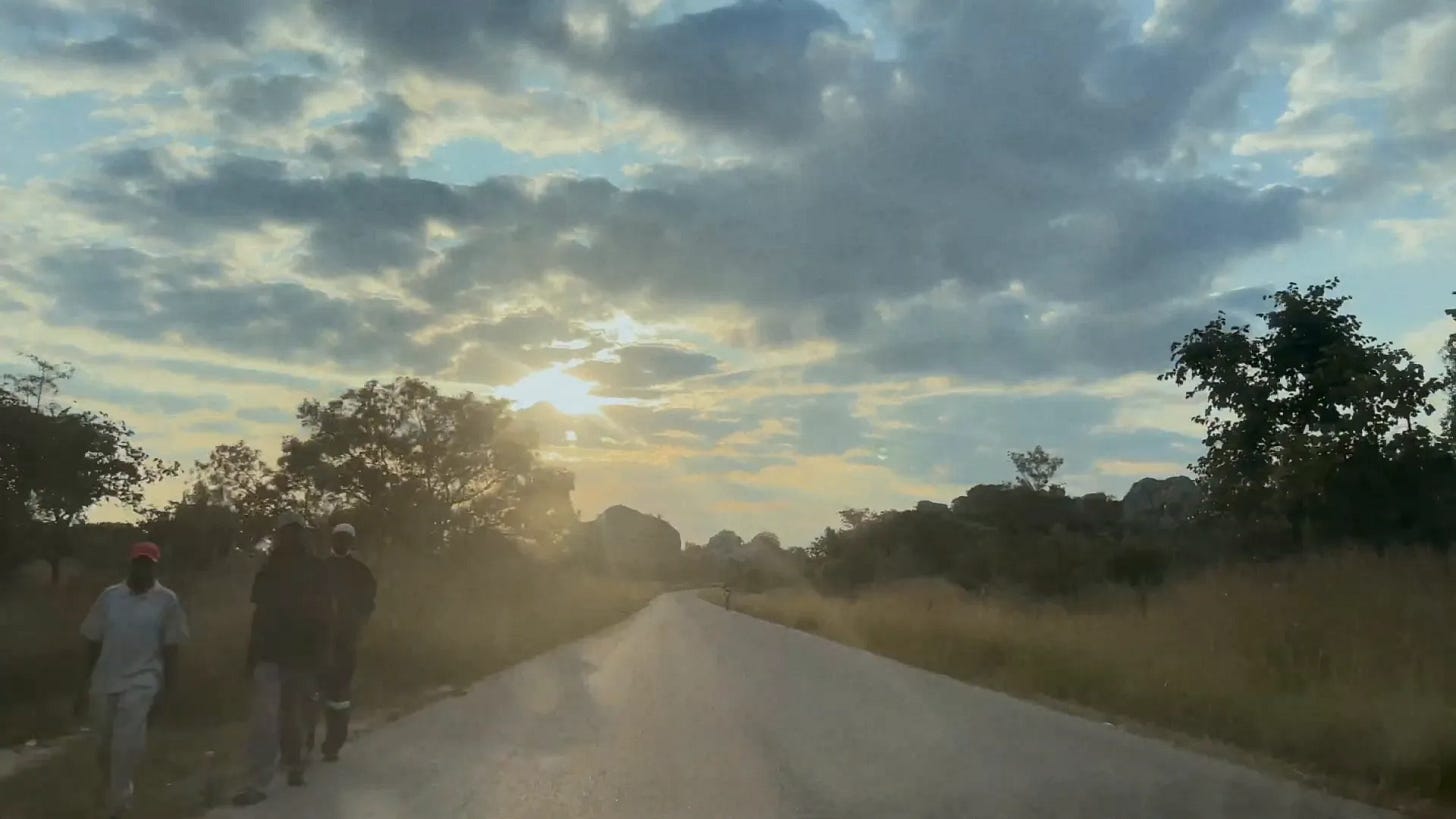 Urban street in Zimbabwe, highlighting challenges faced by youth