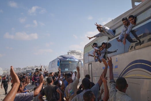 Freed Palestinian prisoners are greeted as they arrive in the Gaza Strip after their release from Israeli jails under a ceasefire agreement between Hamas and Israel, in Khan Younis, southern Gaza Strip, Monday, Oct. 13, 2025. 