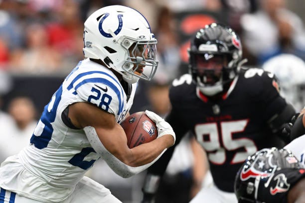 Jonathan Taylor of the Indianapolis Colts runs with the ball during the first quarter against the Houston Texans at NRG Stadium on October 27, 2024...
