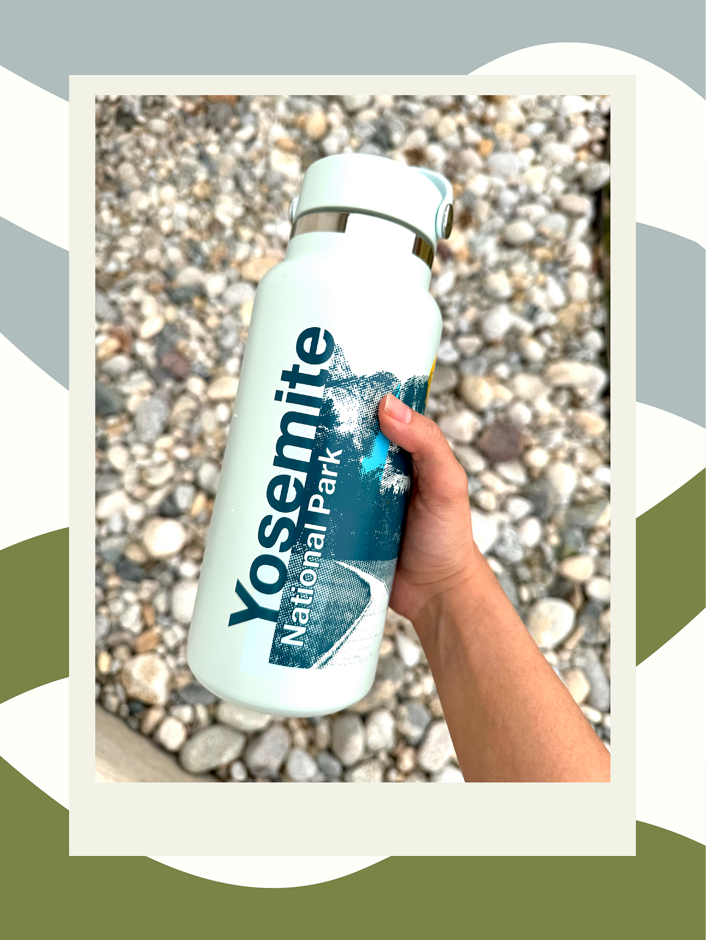 light blue water bottle with a dark blue photo of a waterfall and the words "Yosemite National Park" printed on it