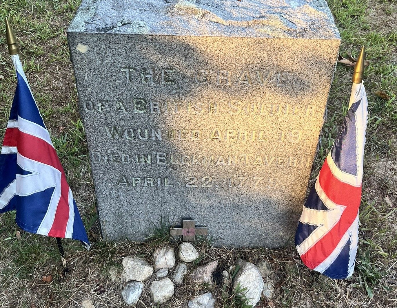 Photo of the grave marker of the Unknown British Soldier buried in the Lexington, Old Burying Ground.