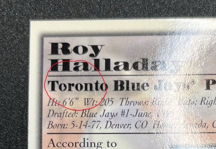 White surface dots on back of 1998 Bowman Roy Halladay Certified Auto Blue PSA 9