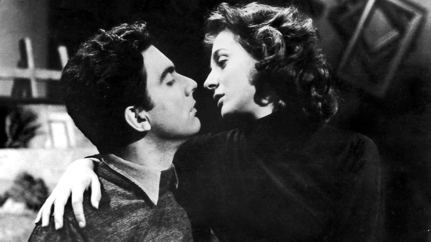 The Counterfeit Coin | Still features a Greek couple in an embrace.