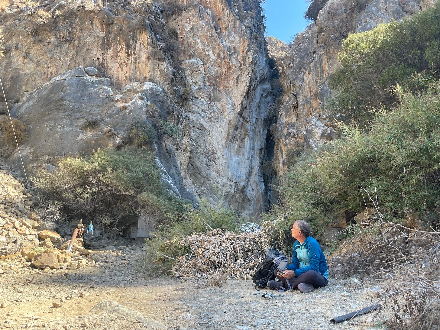 Chris sitting at the mouth of the gorge.