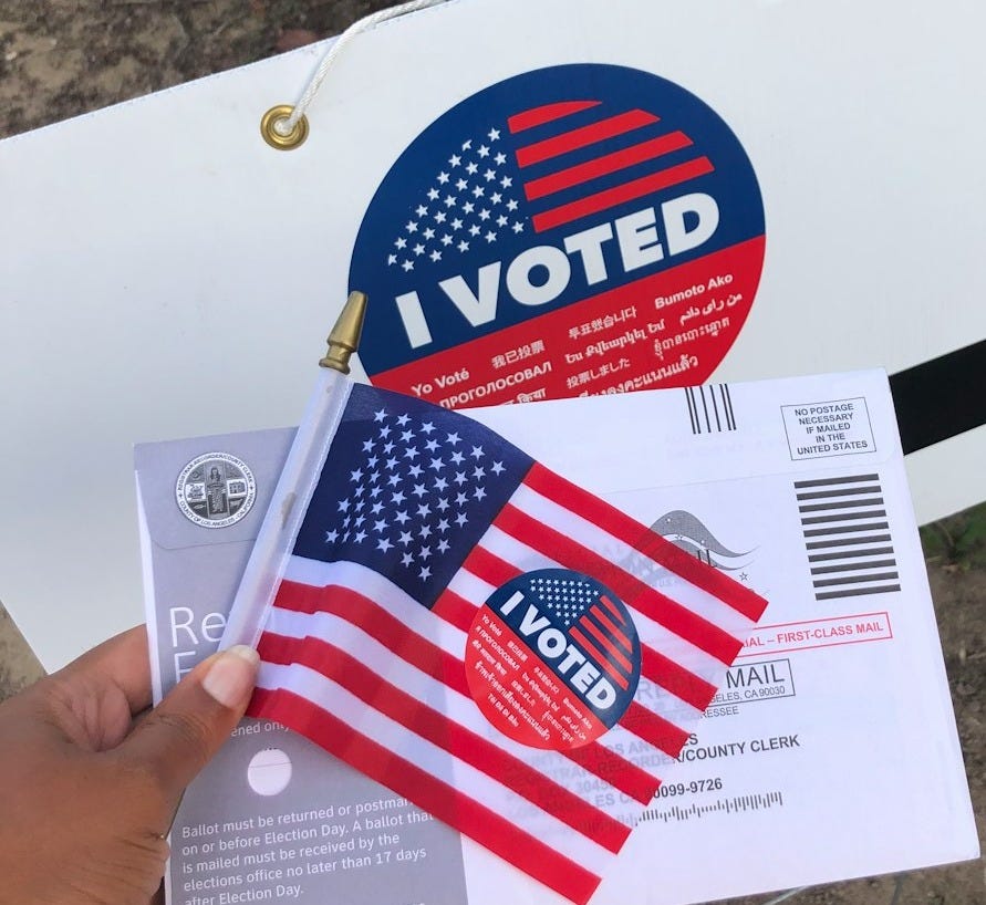 person holding white and red box