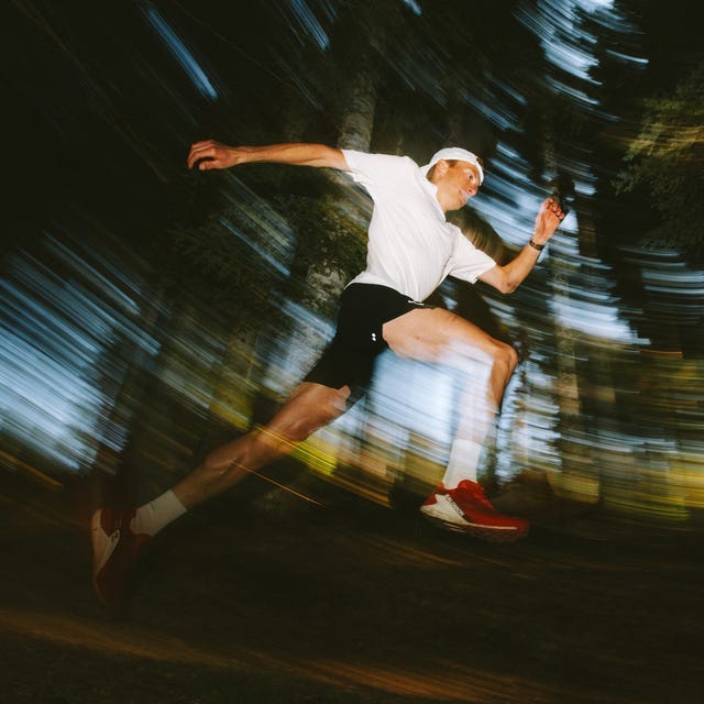 Runner in motion on a forest trail, captured with a motion blur effect. Runner in motion on a forest trail, captured with a motion blur effect.