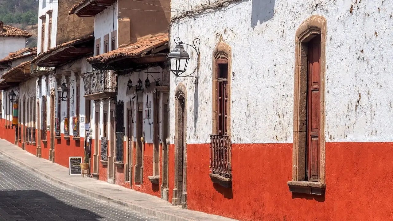 A street with red and white buildings