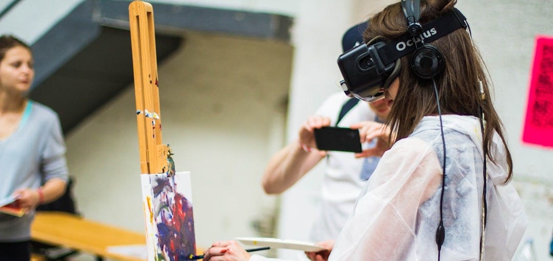 woman doing painting during daytime