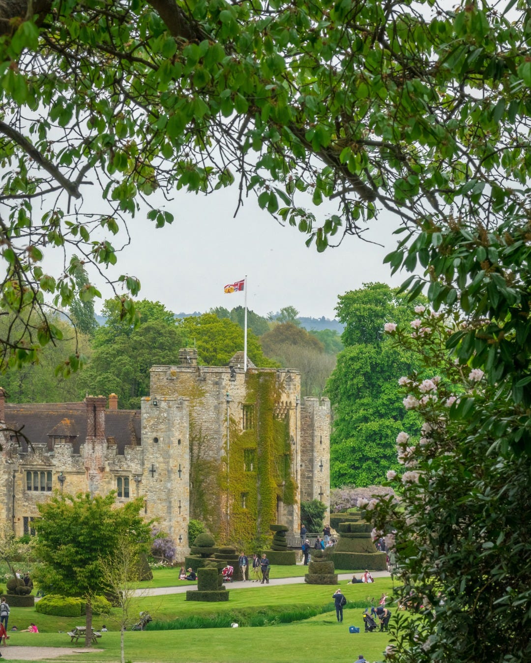 May be an image of 4 people, castle and the Cotswolds