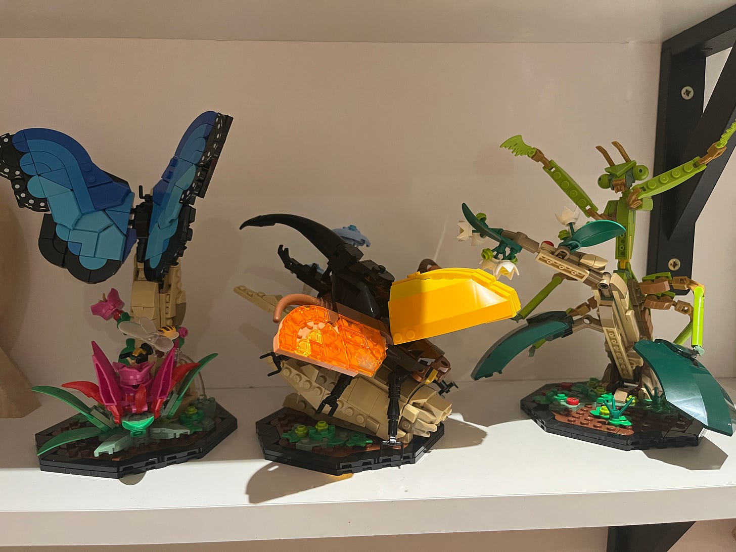 Lego insects, L-R: a butterfly, a beetle, and a praying mantis
