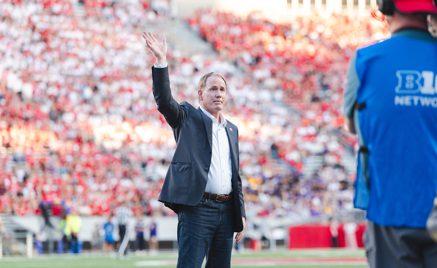 Wisconsin athletic director Shawn Eichorst waves from the field at Camp Randall Stadium. Wisconsin athletic director Shawn Eichorst waves from the field at Camp Randall Stadium.