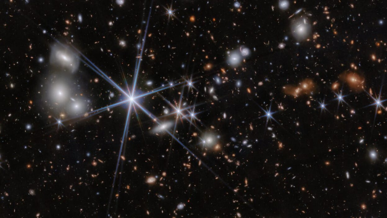 A deep view of the universe teeming with galaxies. A deep view of the universe teeming with galaxies.