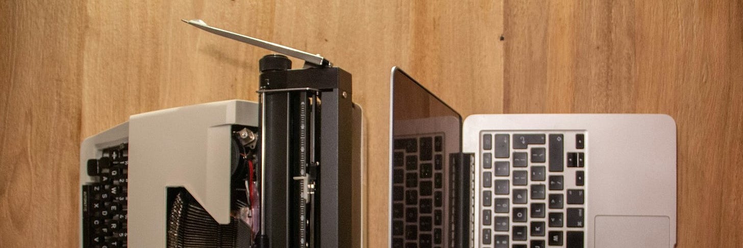 macbook pro on brown wooden table
