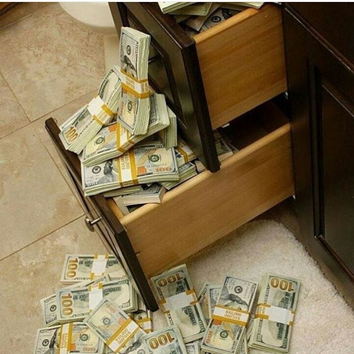 Money Stacks and Cash Drawer: Financial Motivation Money Stacks and Cash Drawer: Financial Motivation