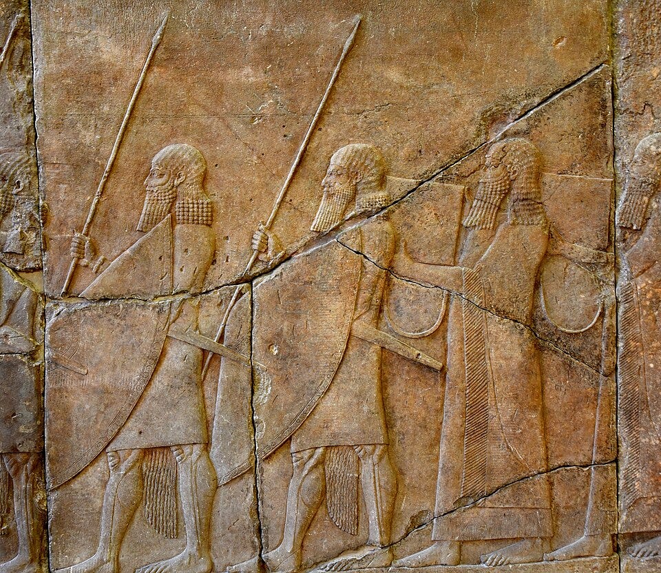 File:Alabaster bas-relief, procession of Assyrian soldiers and musicians carrying rectangular drums, reign of Sennacherib, from Nineveh, Iraq. 7th century BCE. Pergamon Museum, Berlin.jpg