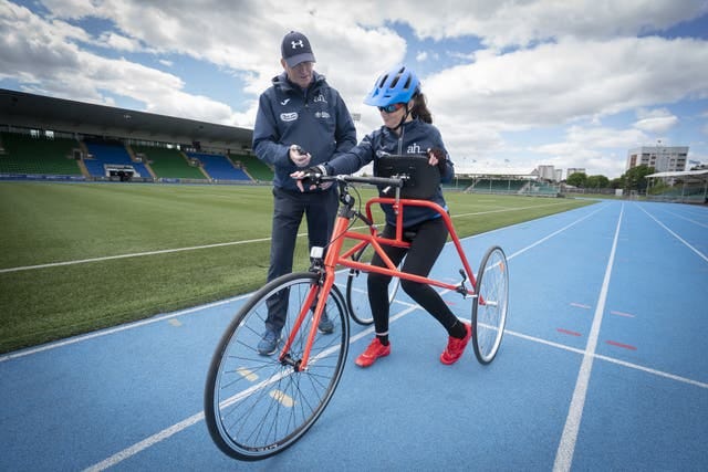 Dr Julie McElroy training for the London Marathon with a frame runner Dr Julie McElroy training for the London Marathon with a frame runner