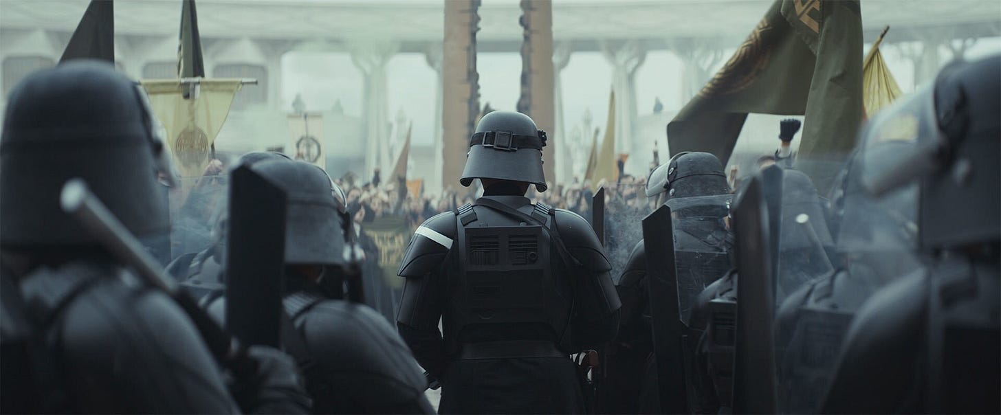 The Empire arrives at the Ghorman riot.