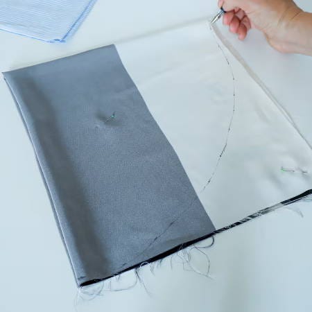 marks to cut a circle from a square piece of fabric marks to cut a circle from a square piece of fabric