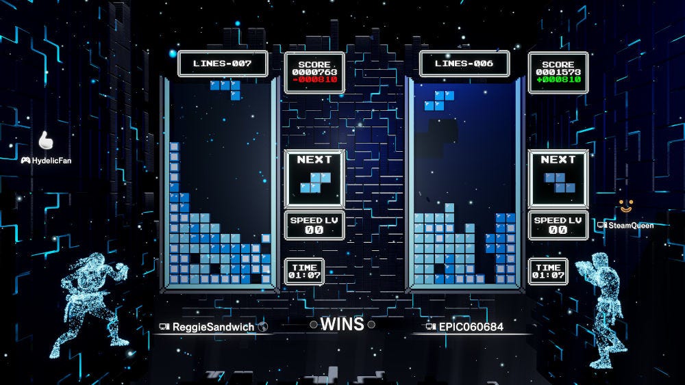 A screenshot of a multiplayer game in Tetris Effect: Connected A screenshot of a multiplayer game in Tetris Effect: Connected