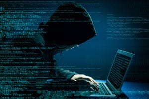A hacker on a computer A hacker on a computer