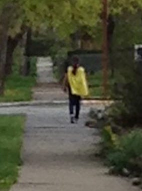 the girl in the yellow supercape