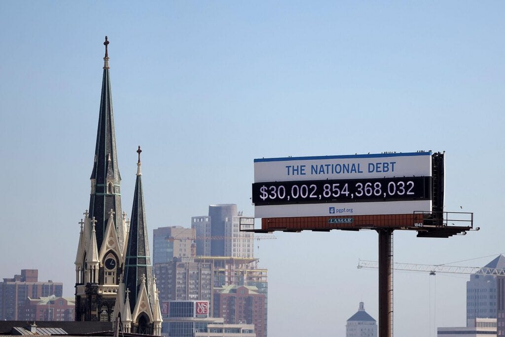Debt Remembered and Debt Ignored: Memorial Day exposes two American debts: one paid in blood, the other dumped on us by Washington.