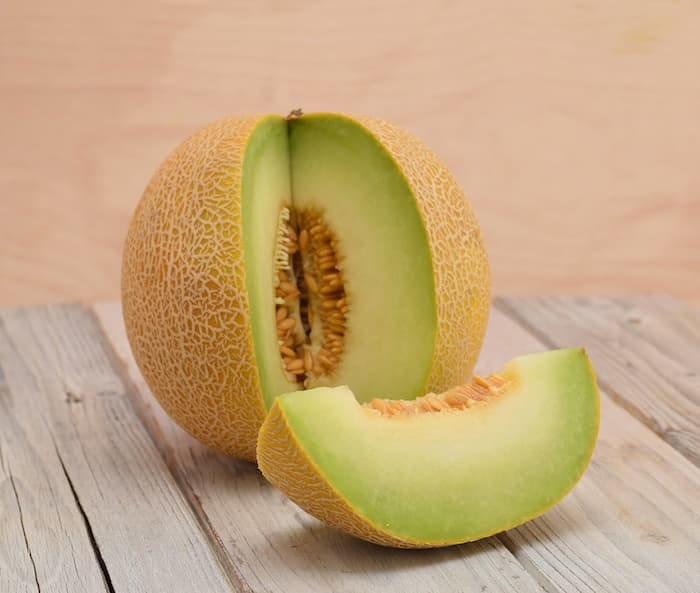 A melon cut in half

Description automatically generated