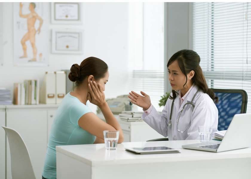 doctor and patient discussing case