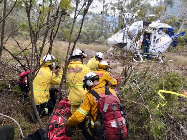 NSW Rural Fire Service (RFS) Remote Area Firefighting Team members about to board a helicopter at Linden Ridge, in the Blue Mountains National Park