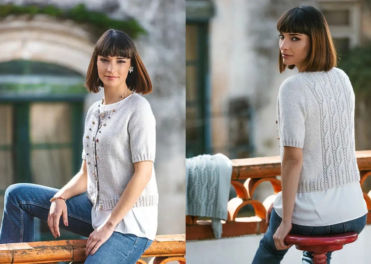 short-haired woman wearing jeans, a white t-shirt and a light grey cardigan with short sleeves