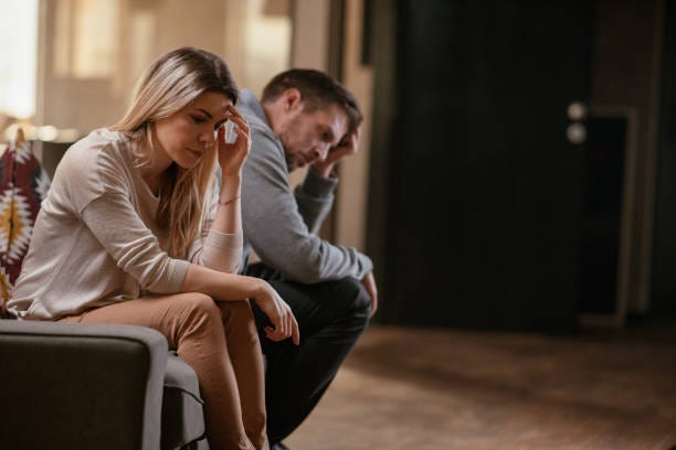 unhappy young couple - two upset couples stock pictures, royalty-free photos & images