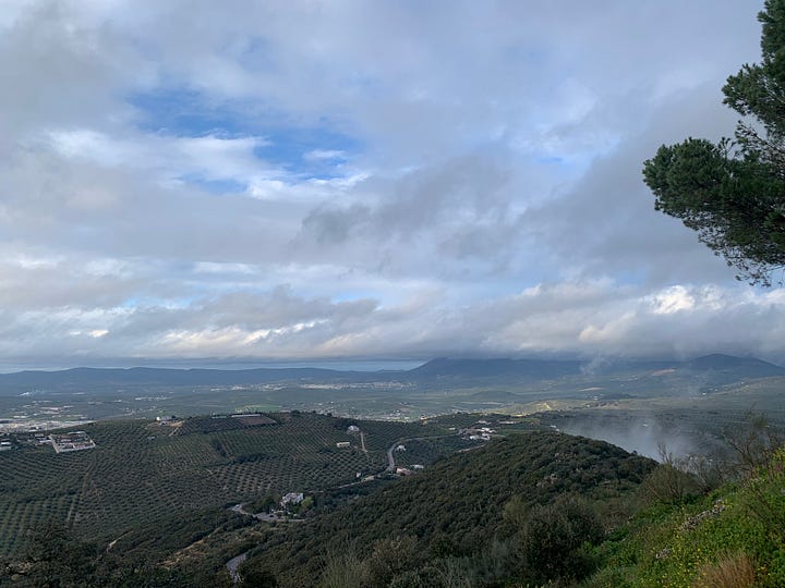 The original Michelin Man (what I look like wrapped up) and views from the mountain looking down on the town where I live.